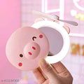 19V69 Cute Piggy Head LED Mirror Fan – Portable USB Rechargeable Makeup Pocket Fan (Random Color)